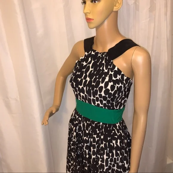 green emerald velvet dress Gucci Iridescent Emerald Green Pleated Silk Blend Mini Dress 38 IT main image 1